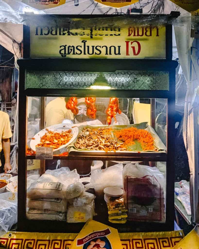 glass case with mock meats and noodles