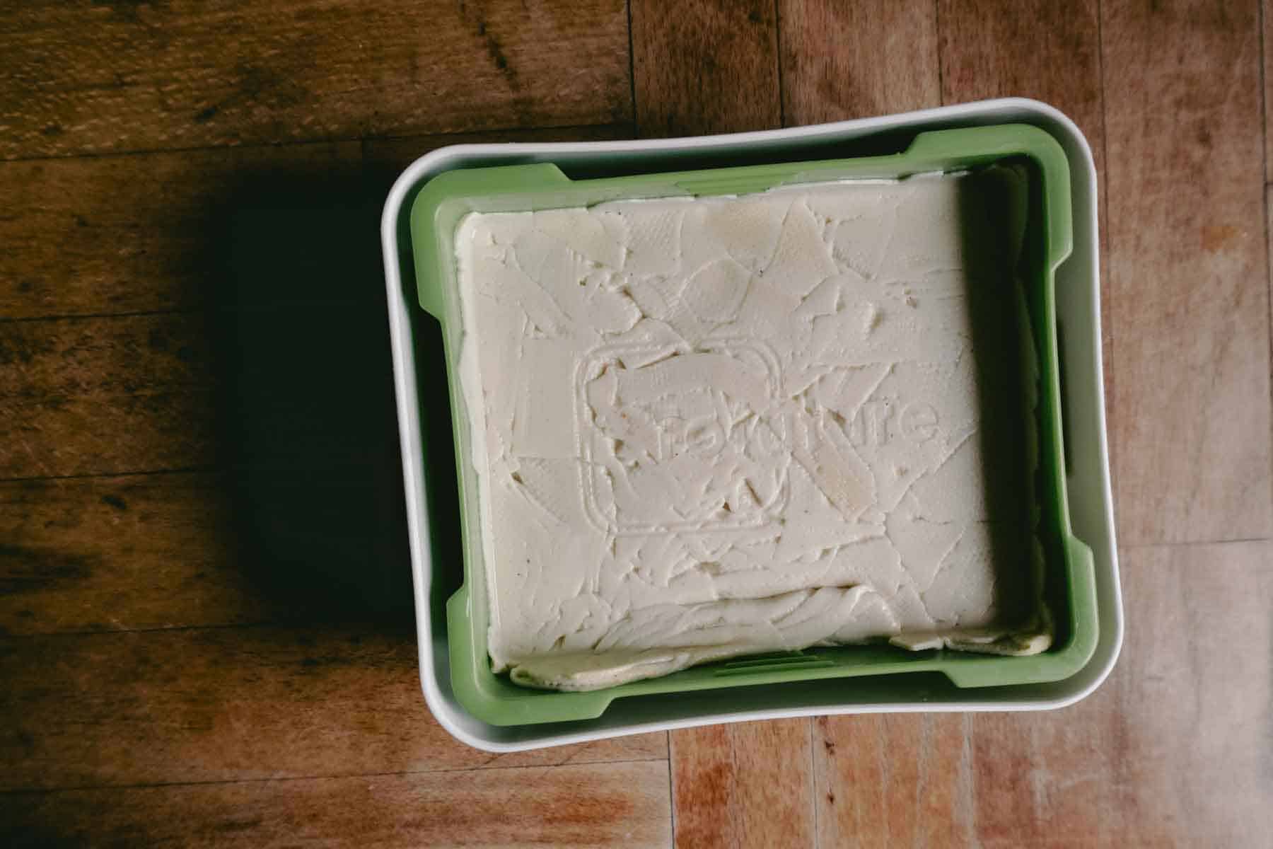 beige block of what looks like tofu, but is made from pressed noodle sheets